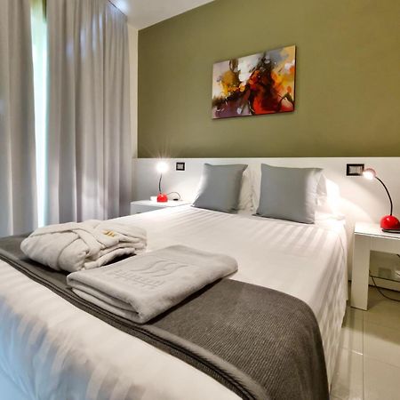 Monaco Suites Hotel Ліньяно-Сабб'ядоро Номер фото